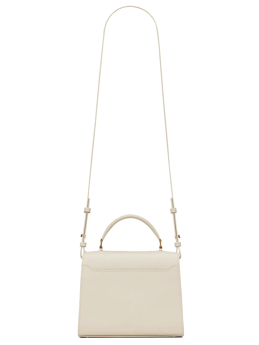 Cassandra Mini Top Handle Bag In Grain De Poudre Embossed Leather