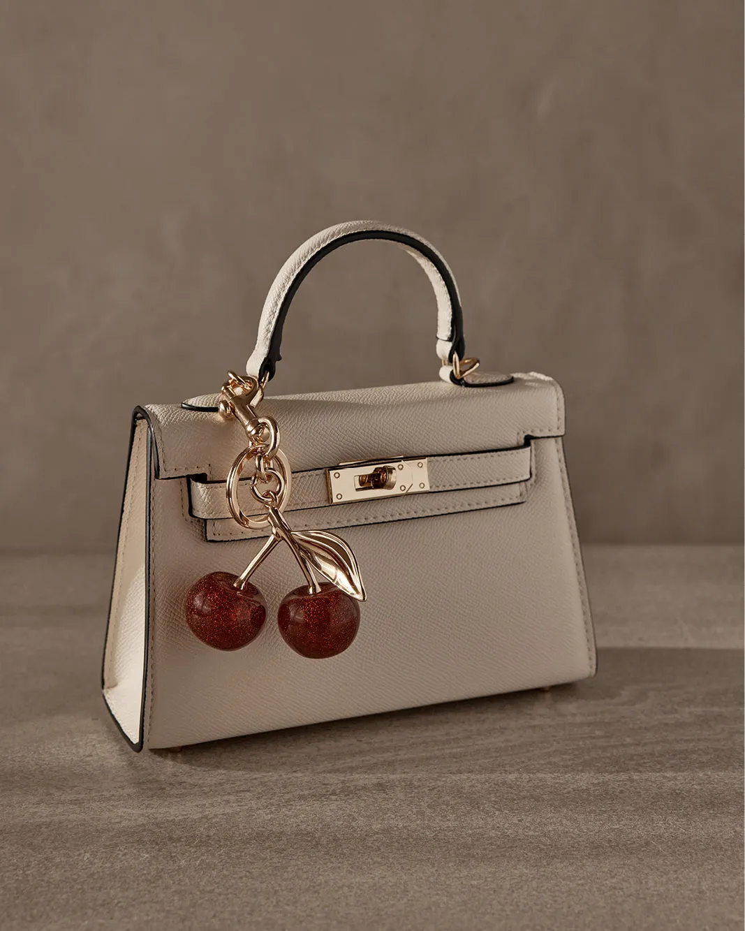 CHERRY BAG CHARM - GOLD