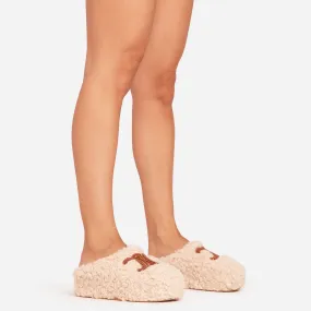 Saskia Logo Detail Flat Slipper In Nude Faux Fur